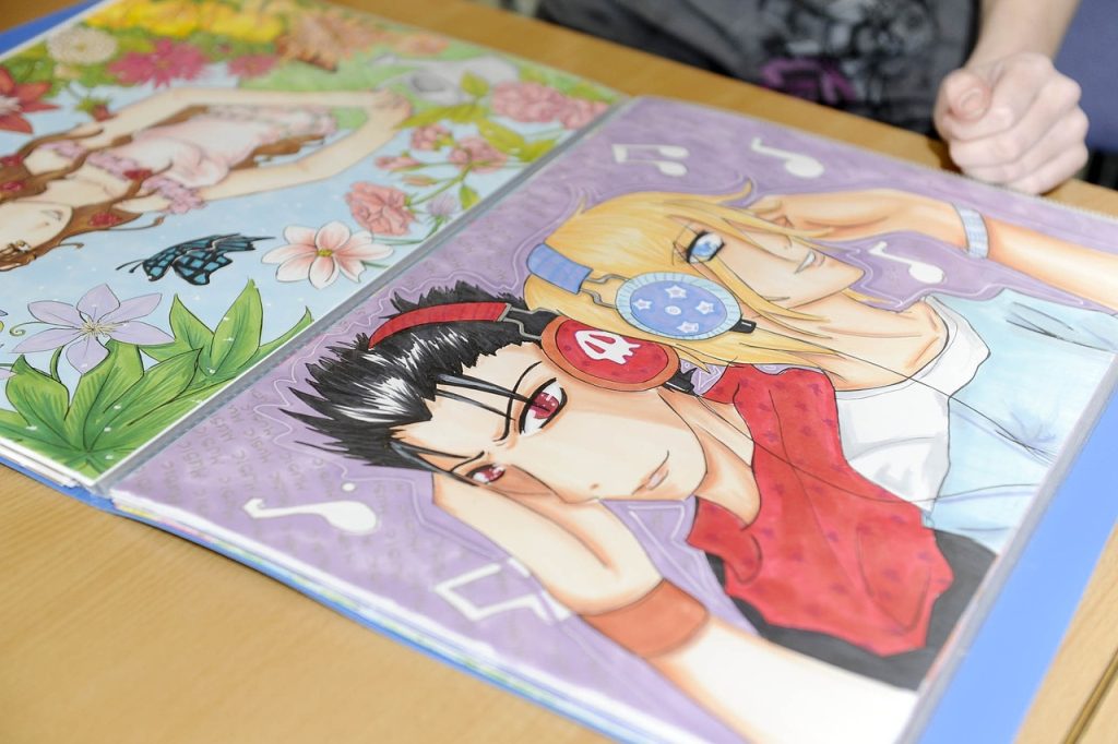 manga illustrant deux personnages féminins aux cheveux colorés portant des casques audio