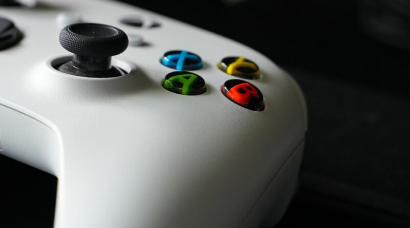 Focus on Xbox controller buttons highlighting gaming technology and design.