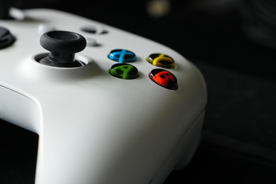 Focus on Xbox controller buttons highlighting gaming technology and design.