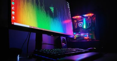 black flat screen computer monitor turned on beside black computer keyboard