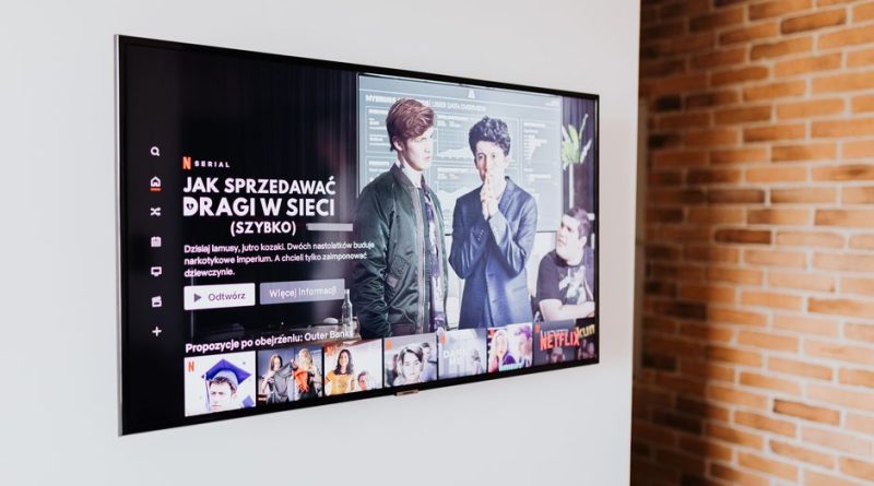 Smart TV displaying streaming content in modern living room setting with exposed brick wall.