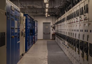 A sophisticated control room filled with electrical panels and equipment for industrial purposes.