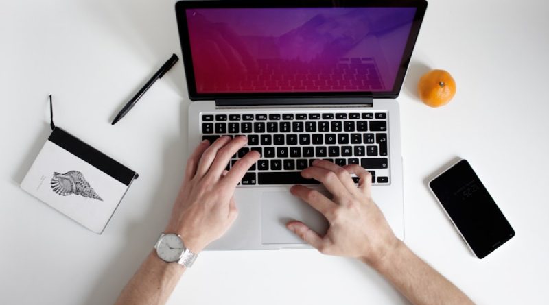 person using laptop computer